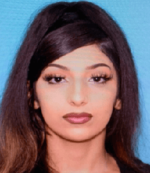 Woman with confident expression, representing San Antonio Crime Stoppers efforts.