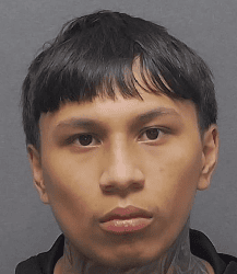 Young man with serious expression, promoting San Antonio Crime Stoppers initiative.