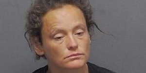 Woman in police mugshot for San Antonio crime investigation.